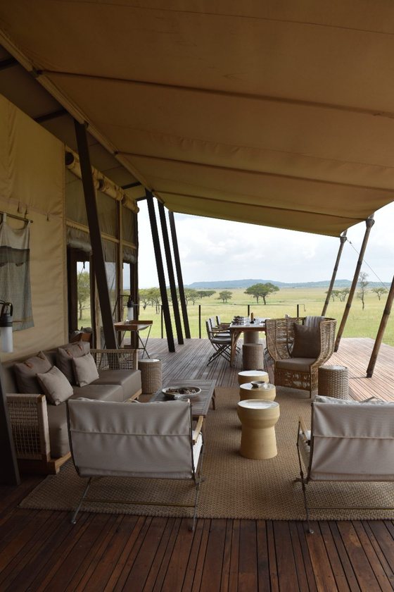 A tented safari suite opening onto the plains.